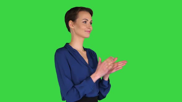 Attractive Caucasian Business Woman Clapping Her Hands on a Green Screen, Chroma Key