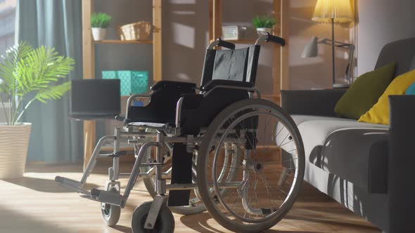 Wheelchair on the Background of a Modern Apartment on a Sunny Day Closeup Nobody