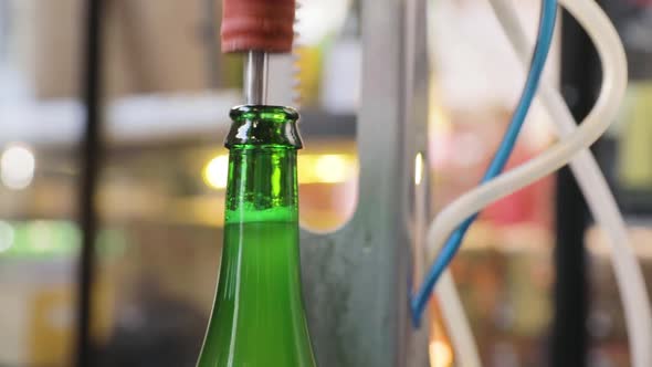 Brewery. Beer Bottle On Conveyor, Vacuum Evaporation And Corking