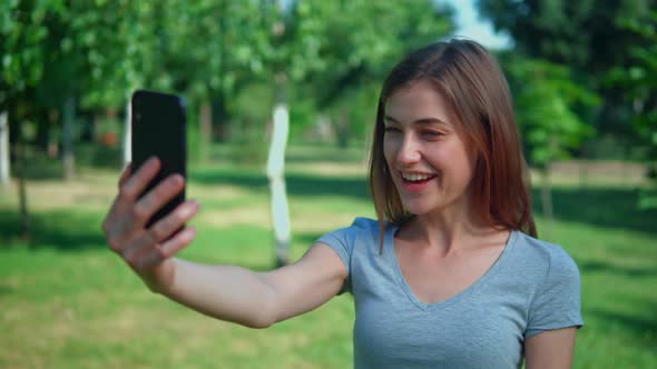 Portrait Woman Chatting Online Outdoors