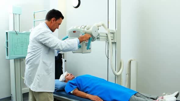 Senior woman undergoing an x-ray test