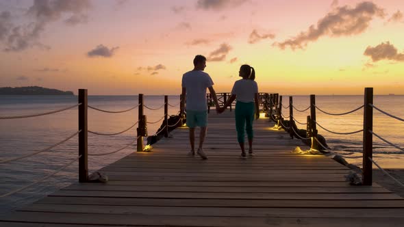 St Lucia Caribbean Couple Men and Women on Vacation Huge Pitons Drone View at Saint Lucia Sugar