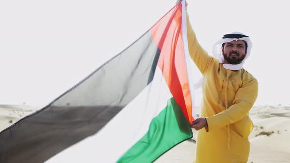 Man walking in the Dubai desert