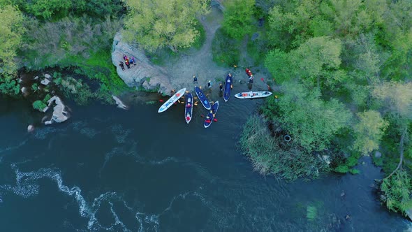 Aerial View of the Winning Rowers Disembarking From Boat Races on the River