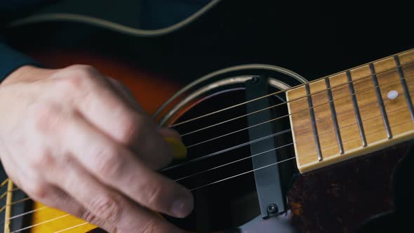 Professional Musician Plays on Metal and Nylon Strings