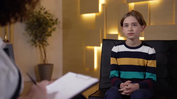 Open Child Willingly Talking to Psychologist