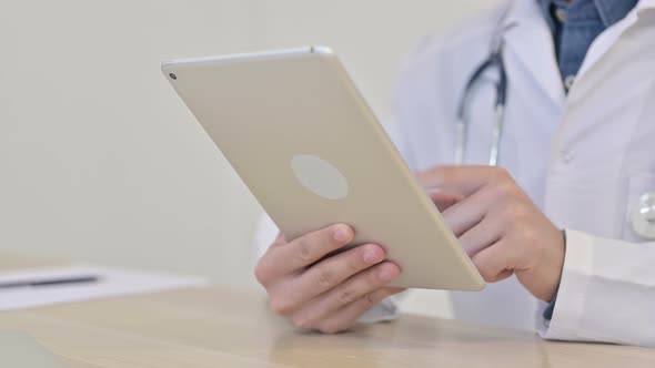 Doctor Using Tablet