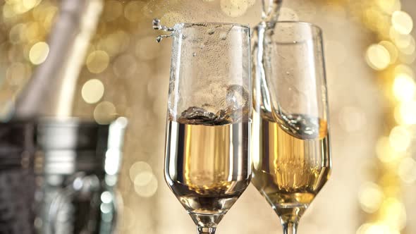 Super Slow Motion Shot of Clinking Two Glasses of Champagne at 1000Fps