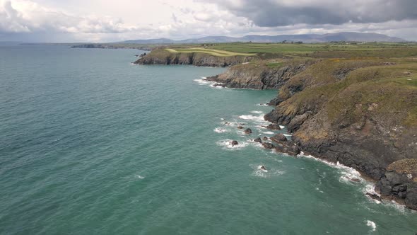 Drone shot of a long coast line in Waterford, Ireland.