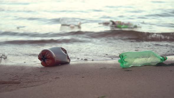Plastic Garbage Lying on the Beach