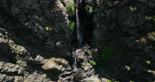 HE SPECTACULAR MEANCERA WATERFALL IN THE NORTH OF EXTREMADURA LANDSCAPED IN A NATURAL PLACEA WATERF