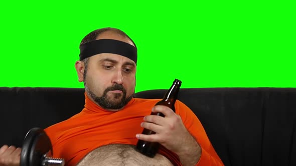 Funny Fat Guy Drink Beer and Doing Dumbbell Training, Green Screen Background. Slow Motion