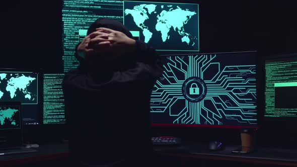 Asian Hacker Upset With Lock Key On Computer Screen