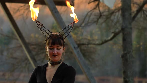 Female with Fire Dragon Helmet Performing