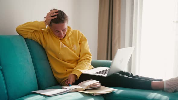 Young Woman Student is Frustrated While Preparing for the Exams