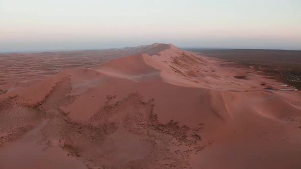Sunrise Over the Sand Dunes in the Desert Aerial View