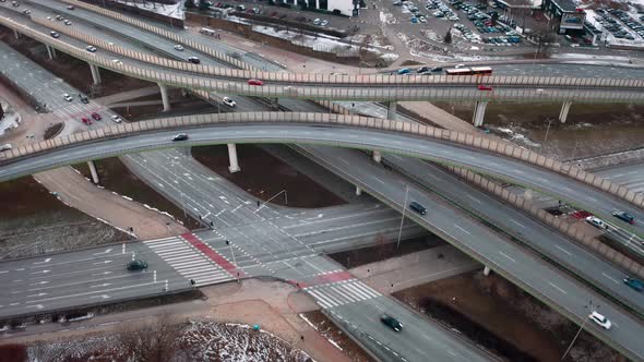 Aerial Flyover Traffic Jam Interchange Road in Winter Evening Drone Shot Top Down View Roadway