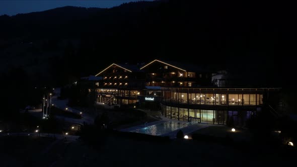 Night View of the Outdoors Pool in a Luxury Hotel in Alps