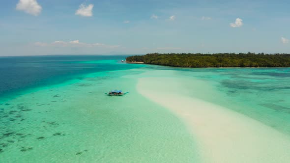 Sandy Beach in the Lagoon with Turquoise Water