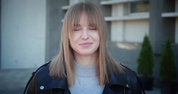 Closeup Portrait of a Young Girl Grey Eyes with Blond Hair