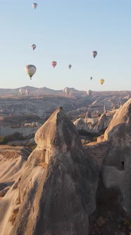 Vertical Video of Hot Air Balloons Flying in the Sky Over Cappadocia Turkey