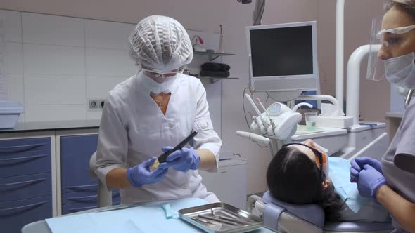 Two Dentists Preparing For Surgery, White Coats And Masks, Hospital Computer