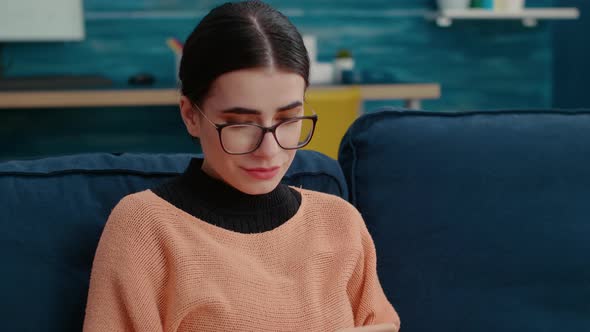 Student Working on School Assignment with Mobile Phone alt