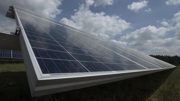 Solar Panels and Blue Sky with Clouds