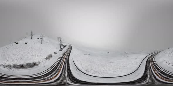 VR 360 Camera Moving Above Snow Rocky Mountains