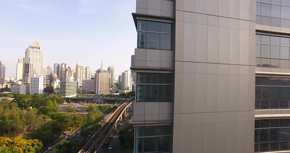 Summer Cityscape With High Building On Foreground