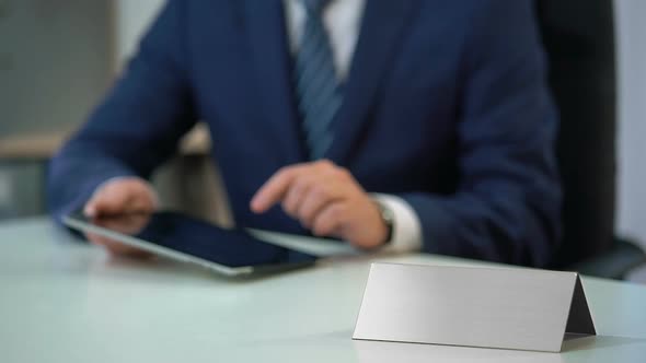 Man in Business Suit Working on Tablet Pc, Blank Nameplate Template for Text