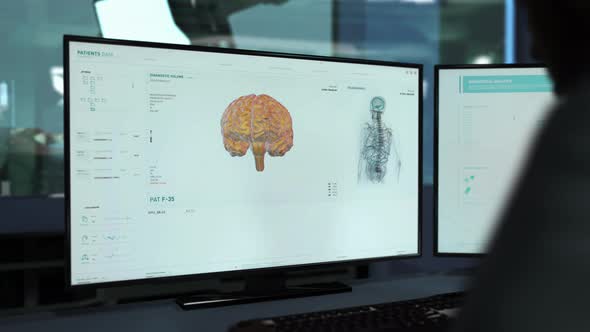 Doctor Using X-ray Diagnostic Analysis Medical Technology To Scan Patients Brain alt