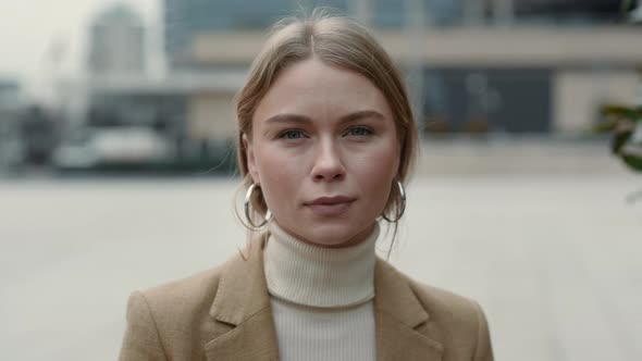 Portrait of Charming Business Woman with Blond Hair