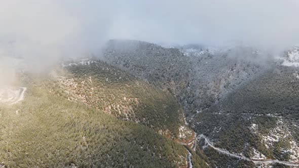 Foggy Mountian Snow Aerial View