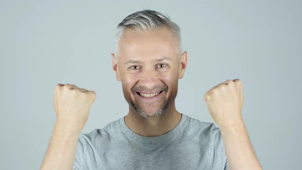 Successful Man Celebrating His Success, Reacting, Amazed