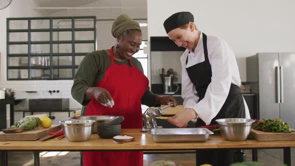 Chefs having fun while cooking