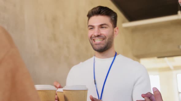 Business People Drinking Takeaway Coffee at Office