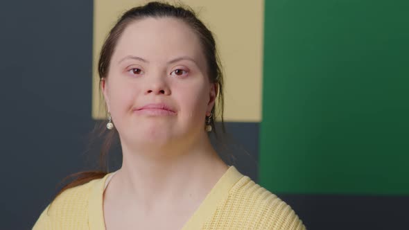 Portrait of Cheerful Girl with Down Syndrome