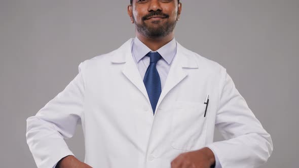 Smiling Male Doctor or Scientist in White Coat