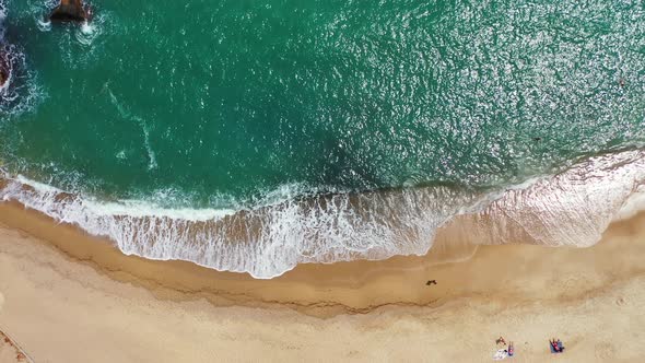 Wide angle aerial abstract view of a sunshine white sandy paradise beach and blue sea background 