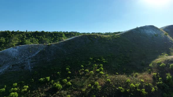 Bikers Descend the Chalk Mountain