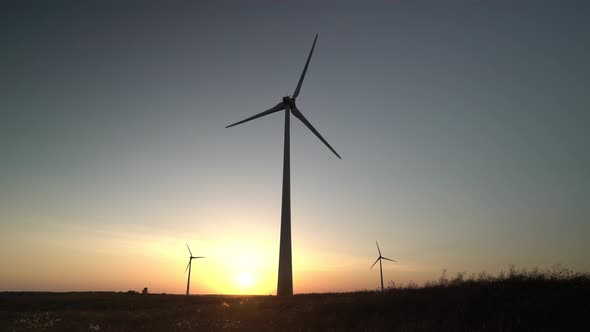 Wind power turbines generating clean renewable energy for sustainable development