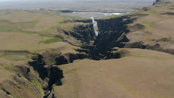 Aerial View of Majestic Canyon of Fjadrargljufur in South Iceland and Fjadra River Flowing Through