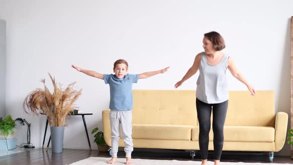 Mom and Son Work Out at Home Sports Son Inspires Mom to Do Sports