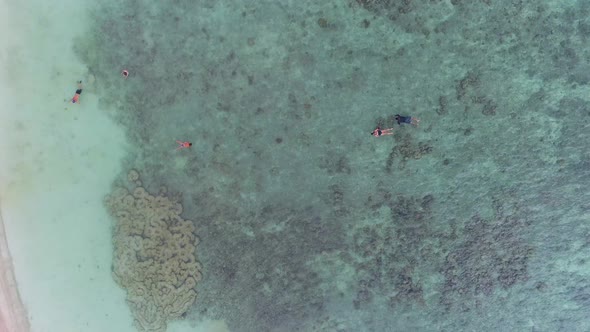 Top View at People  on Coral Beach