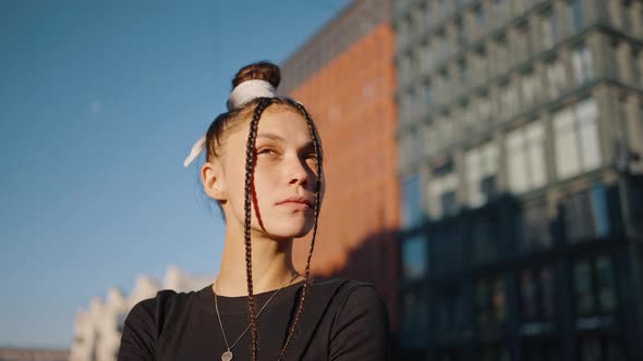 Young Woman Dancer Looks with Thoughtful Expression Closeup