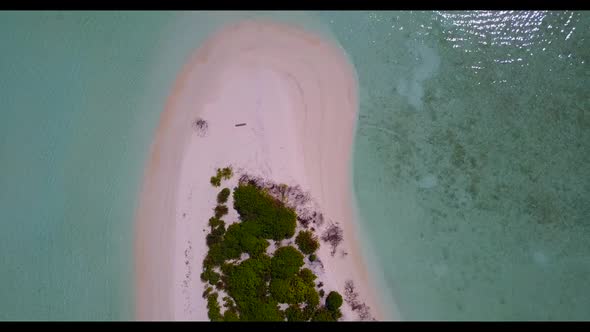 Aerial top down abstract of exotic lagoon beach voyage by turquoise ocean and white sand background 
