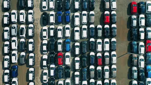 Aerial Shot of New Cars at a Car Dealer Parking Lot.