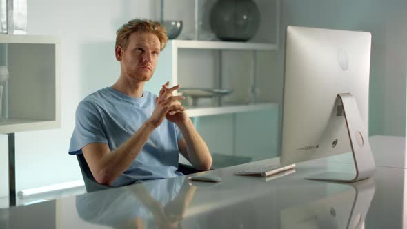 Business Owner Videocalling Client Contemplating Project Ideas at Home Office