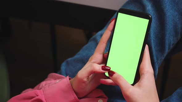 Close Up Woman Hands Holding Chromakey Green Screen Smartphone Watching Content Swiping Scrolling